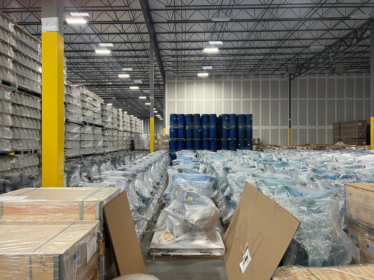 Warehouse with packed goods and cartons