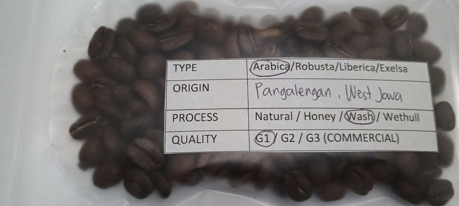 February 2026 Wonosalam East Java coffee sample with specification label
