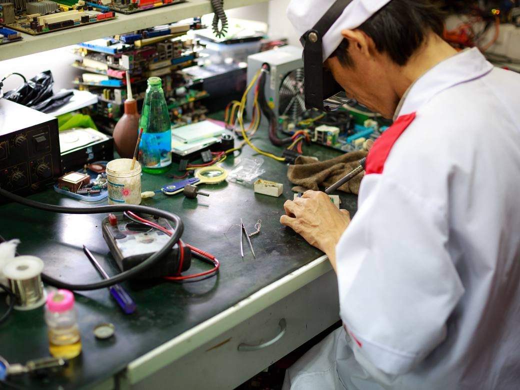 Inspector checking products on site before shipment